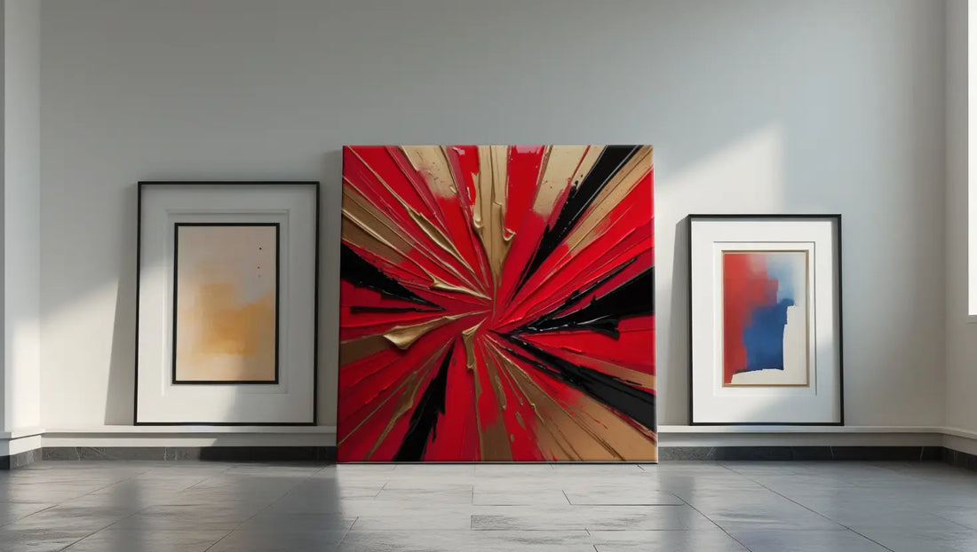 Bold abstract artwork featuring radiating red, black and gold lines bursting from a central point.