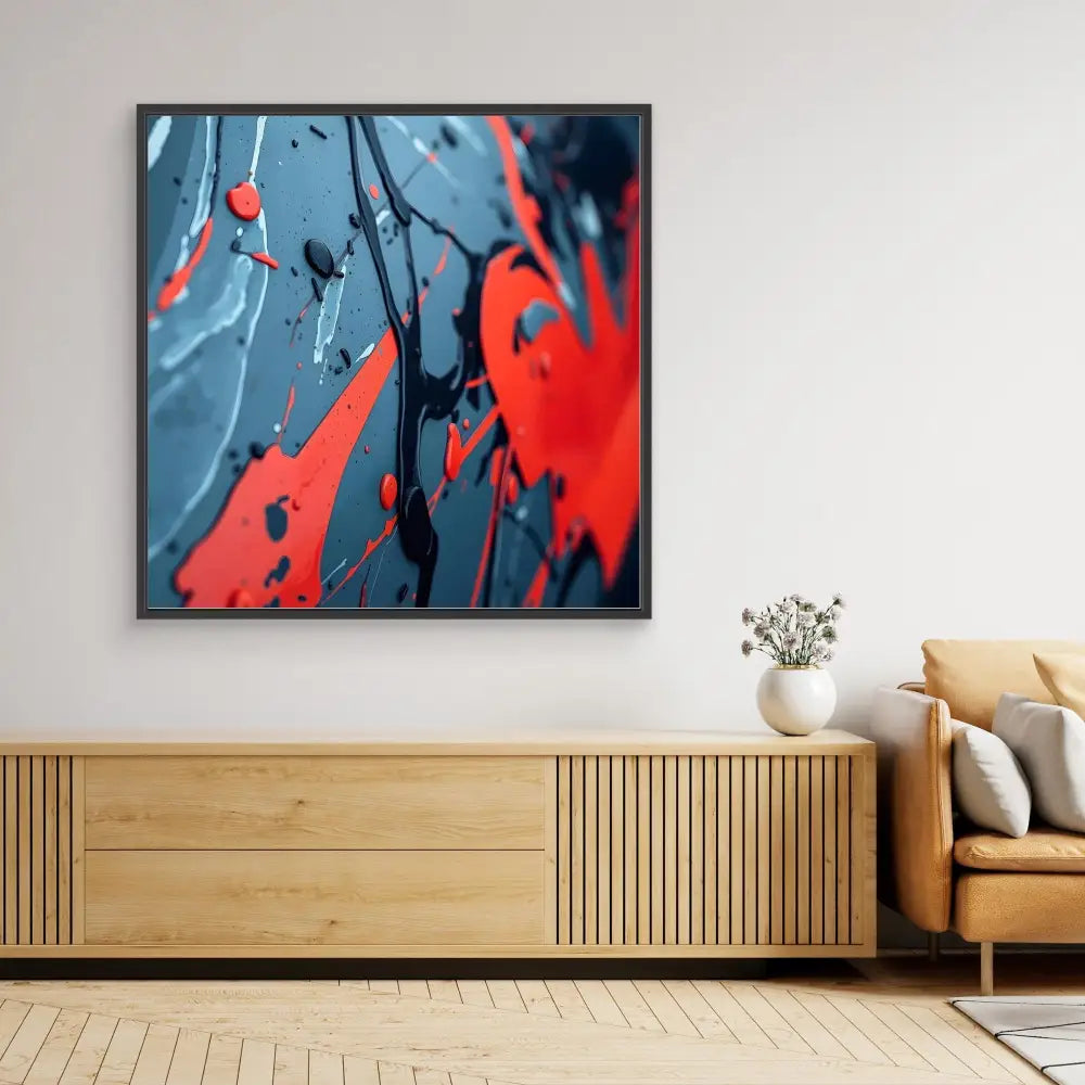 Abstract artwork featuring dramatic red paint splatters against a blue background.