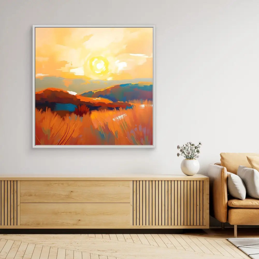 Abstract landscape painting featuring a sunset over mountains in warm orange and yellow tones.