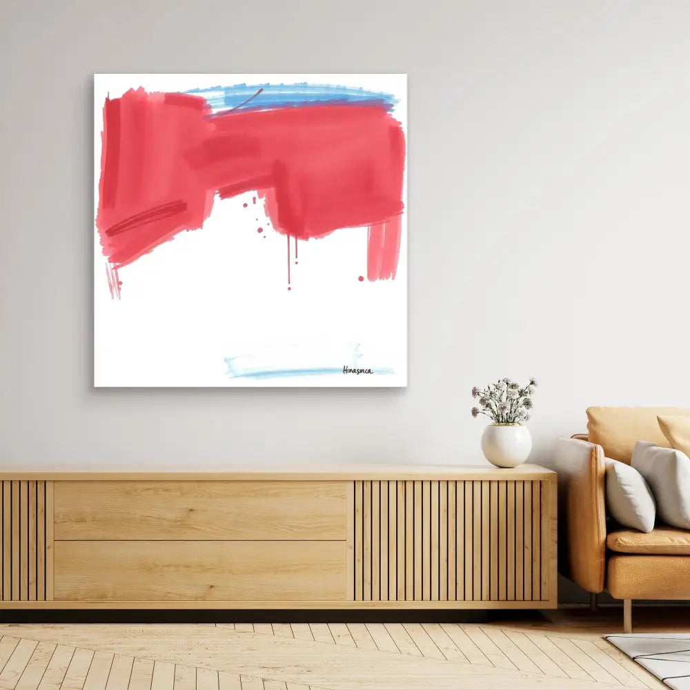 Abstract painting with bold red brushstrokes and touches of blue on white canvas.