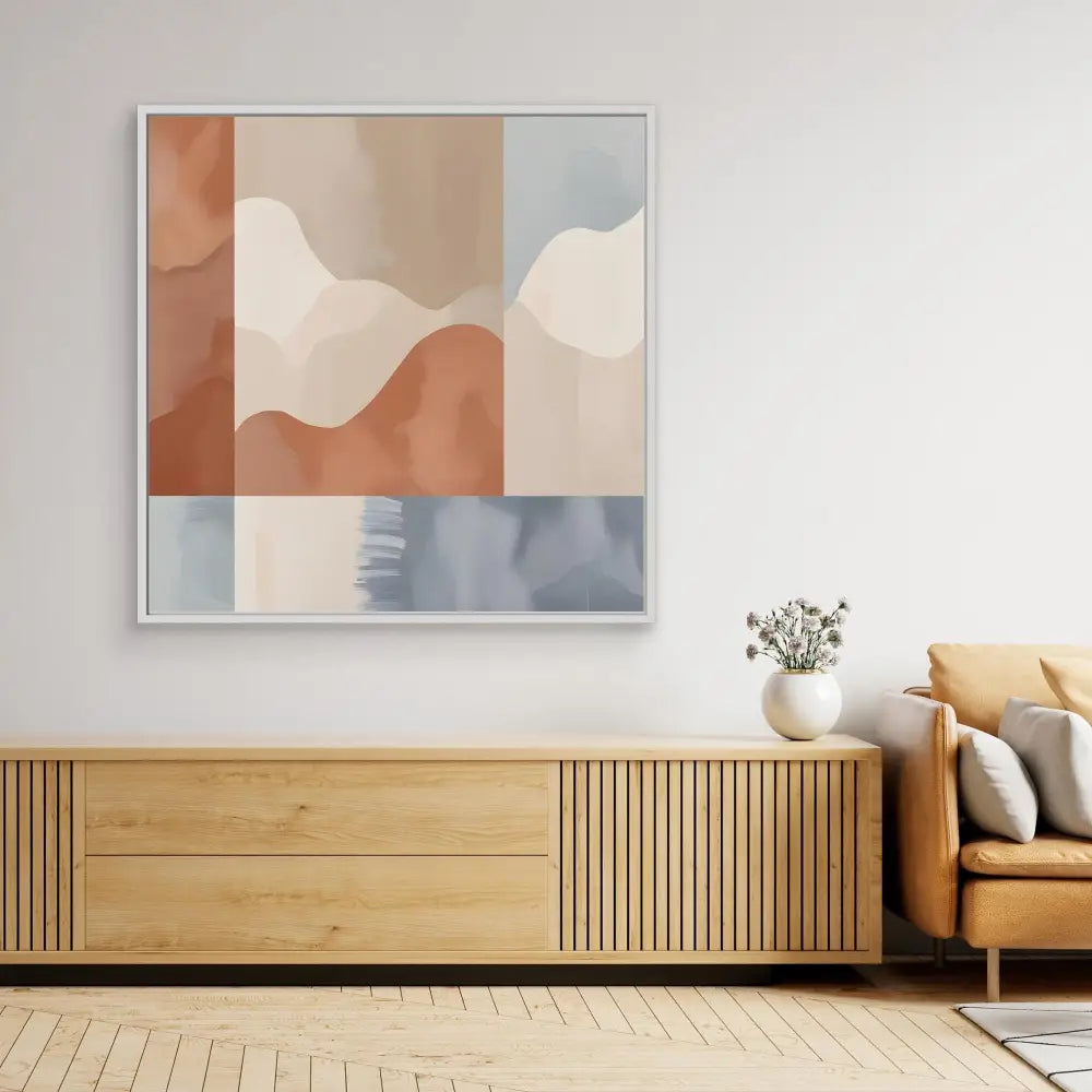 Abstract wall art featuring curved shapes in terracotta, cream, and blue tones.