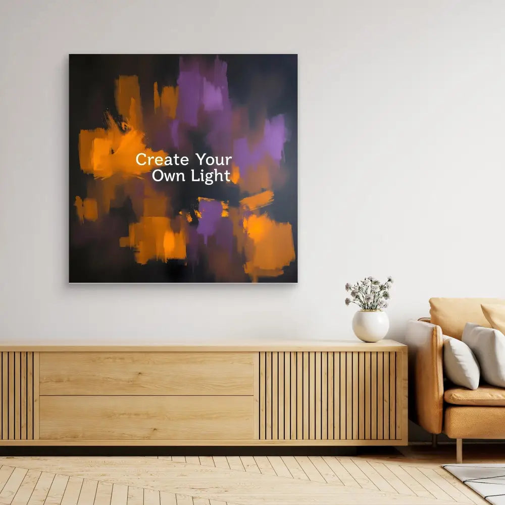 Abstract wall art featuring orange and purple brushstrokes with white text reading ’Create Your Own Light’