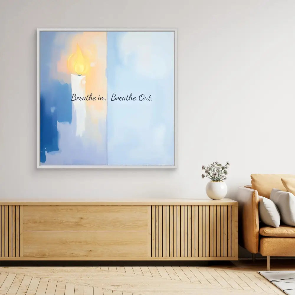 Abstract wall art featuring the text ’Breathe in, Breathe Out’ on a blue and white background with a warm glowing accent.