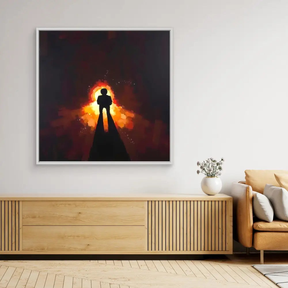 A dramatic silhouette artwork showing a figure standing against a fiery orange glow.