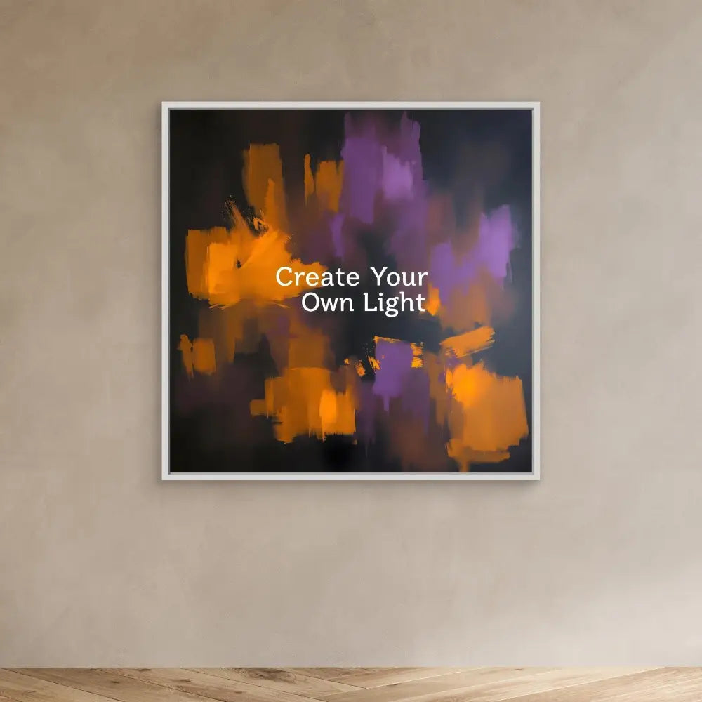 Framed abstract artwork featuring orange and purple brushstrokes with white text reading ’Create Your Own Light’