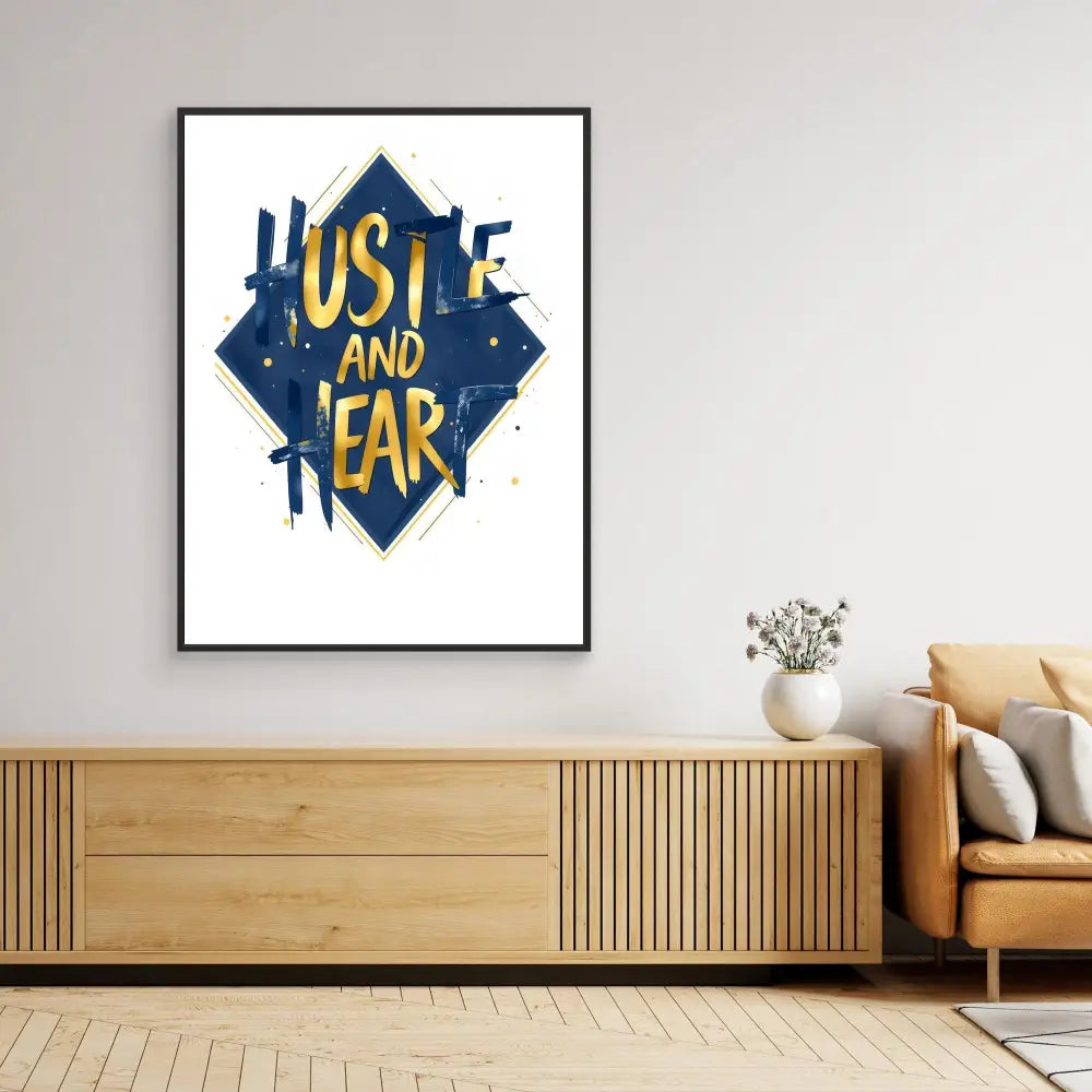 Framed art print featuring ’Hustle and Fear’ text in blue and yellow against a dark diamond shape.