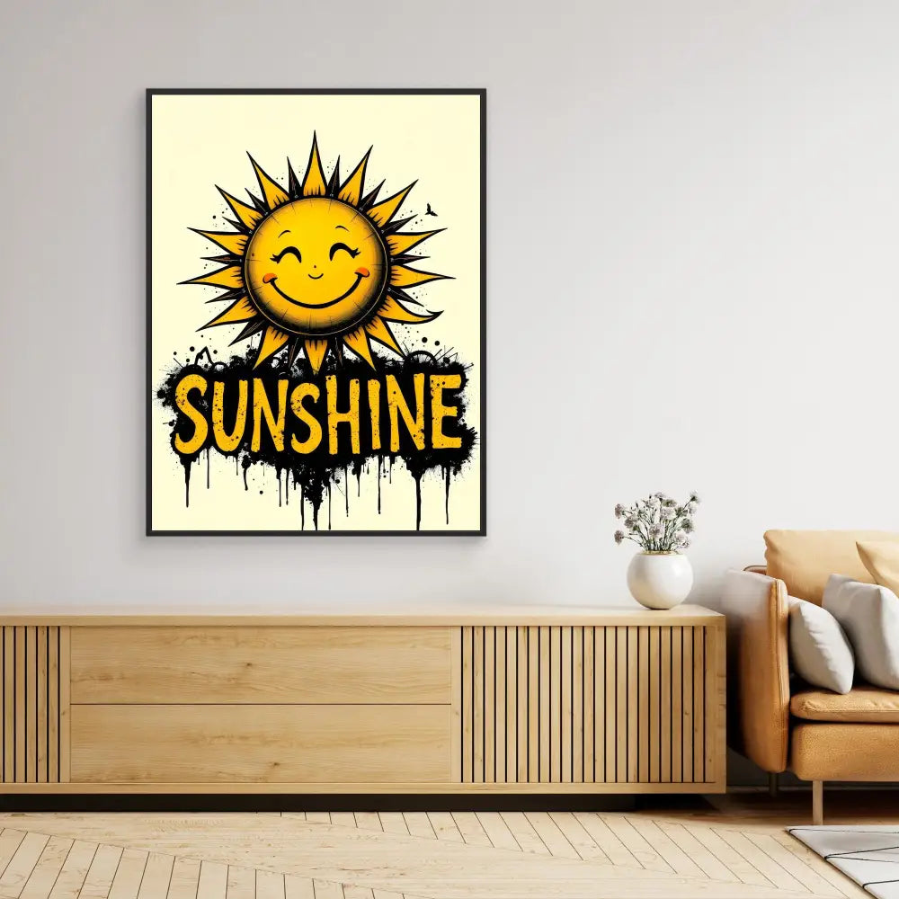 A framed artwork featuring a smiling cartoon sun with ’SUNSHINE’ text dripping below it.