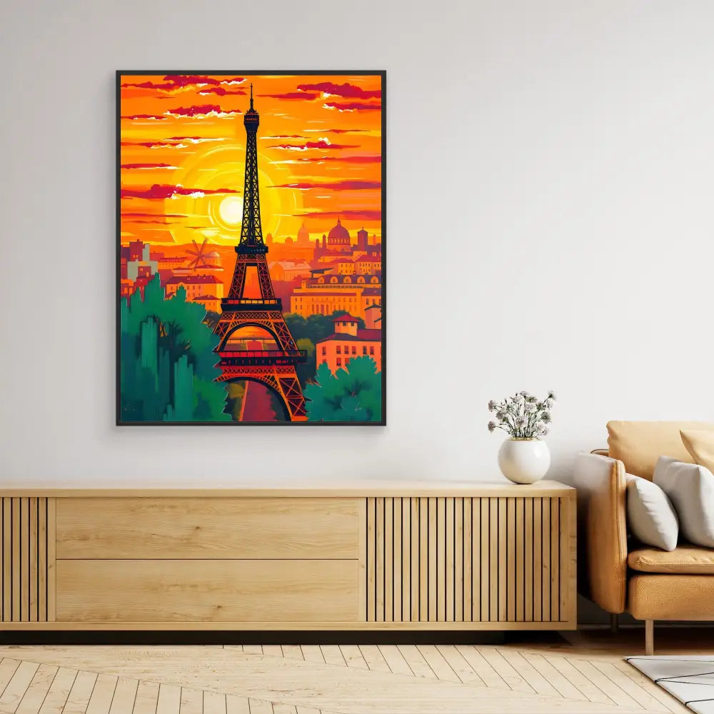 Framed artwork depicting the Eiffel Tower against a vibrant orange sunset.