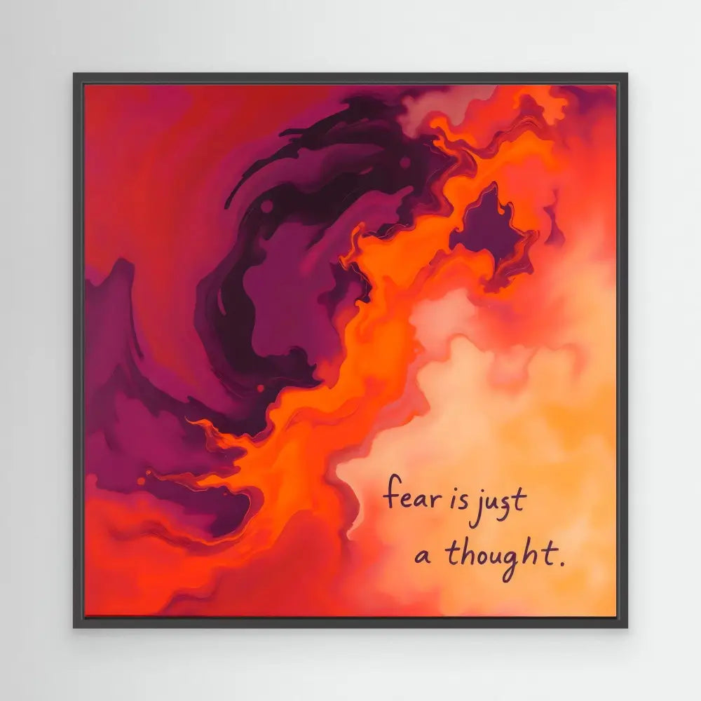 Framed artwork featuring swirling purple and orange clouds with text reading ’fear is just a thought.’