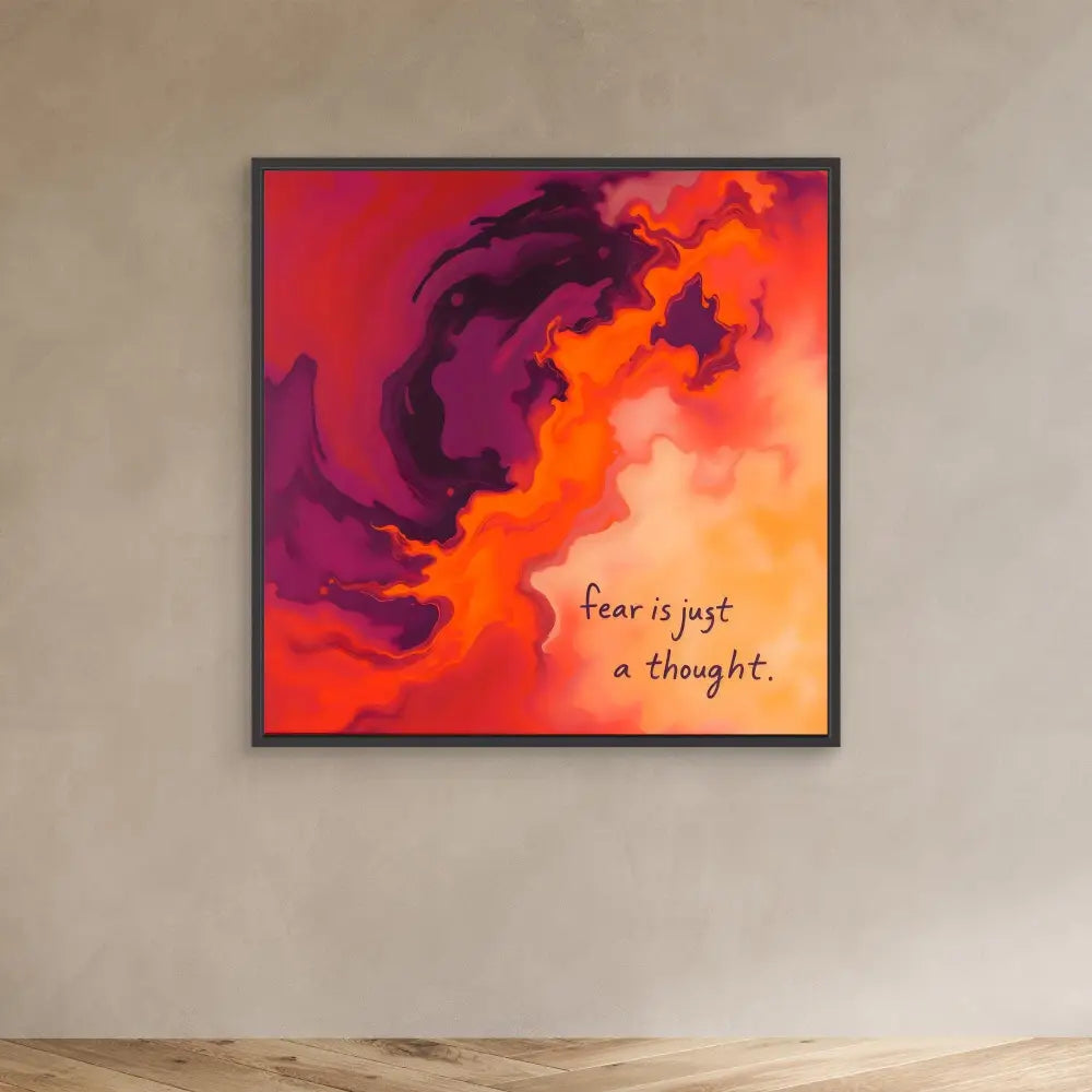 Framed artwork featuring swirling purple and orange clouds with text reading ’fear is just a thought’