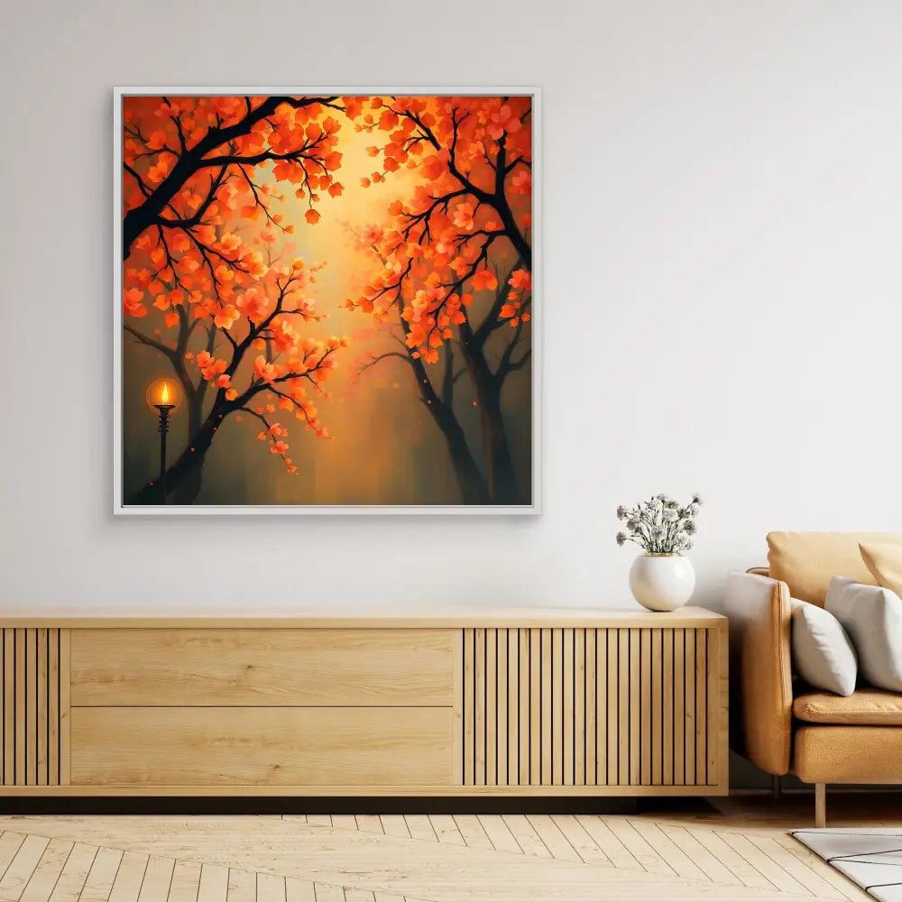 A framed autumn landscape painting featuring orange-leaved trees against a misty sunset sky.