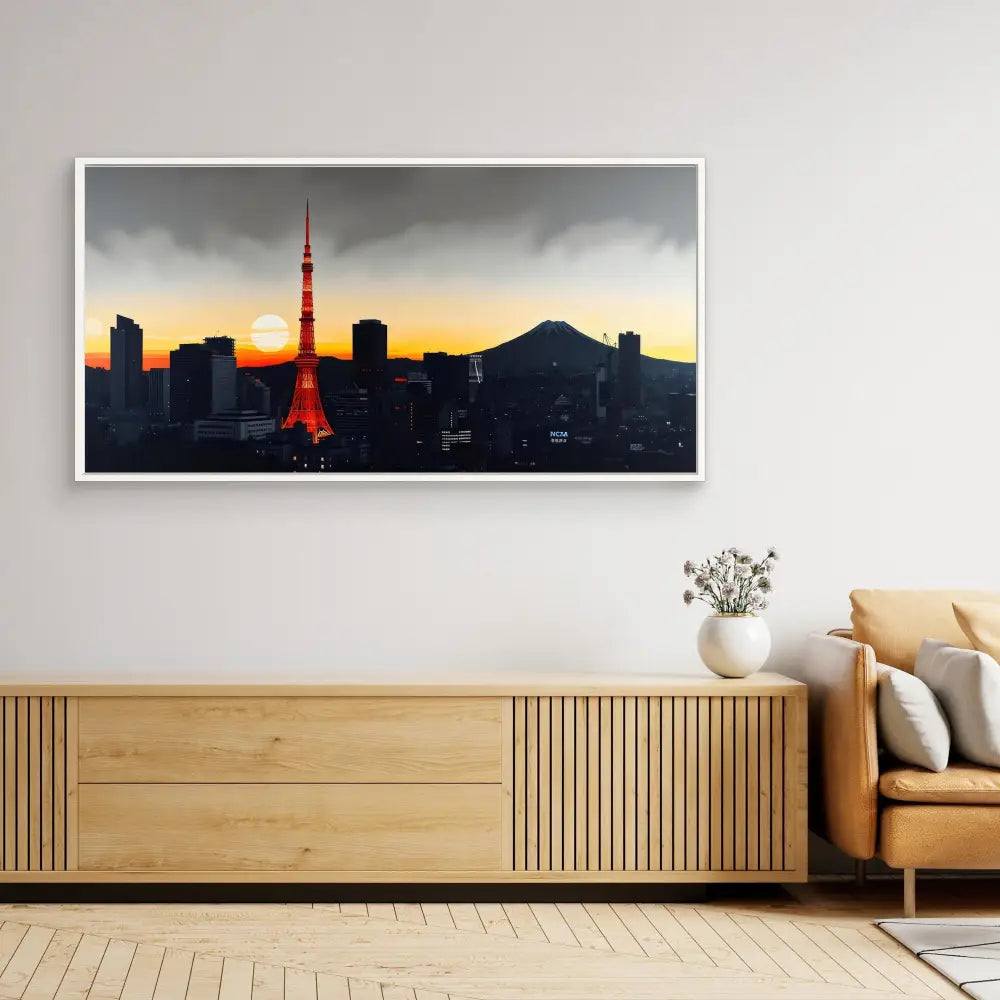 A framed cityscape photograph featuring Tokyo Tower and Mount Fuji at sunset.