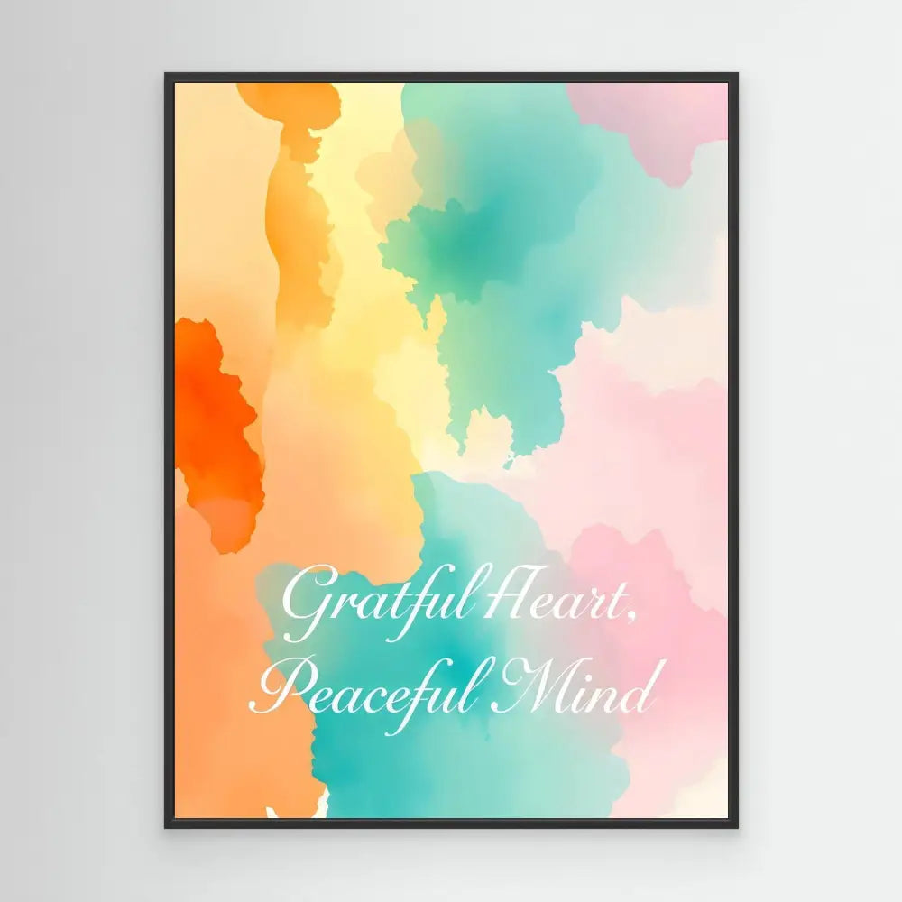 Framed inspirational quote ’Grateful Heart, Peaceful Mind’ on a watercolor background with orange, yellow, turquoise and pink hues.