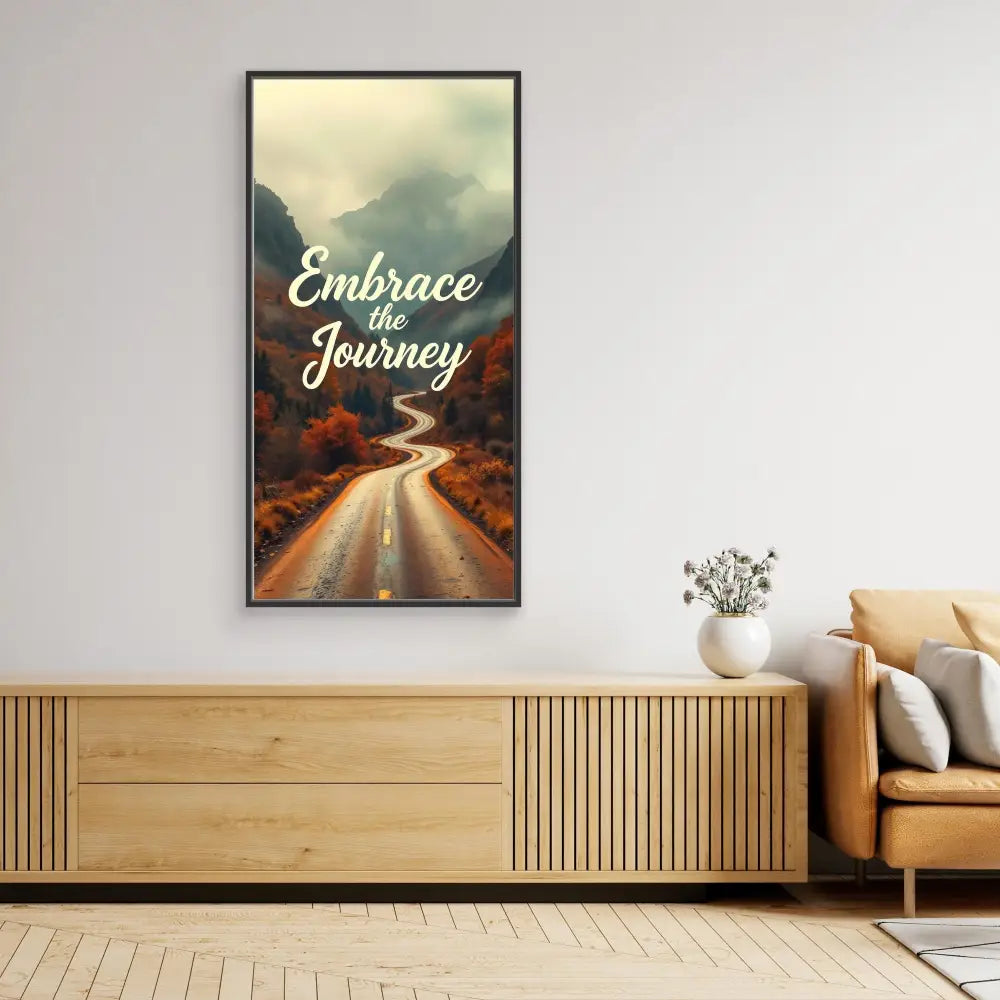 Framed motivational artwork featuring a winding road and ’Embrace the Journey’ text over an autumn landscape.