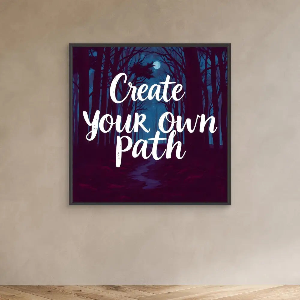 A framed motivational artwork featuring the text ’Create your own path’ against a dark forest scene with a moon.