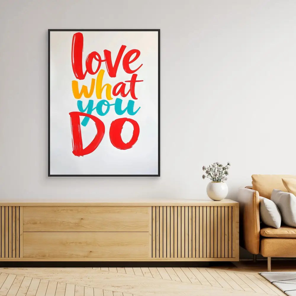 A framed motivational poster with colorful text reading ’love what you do’