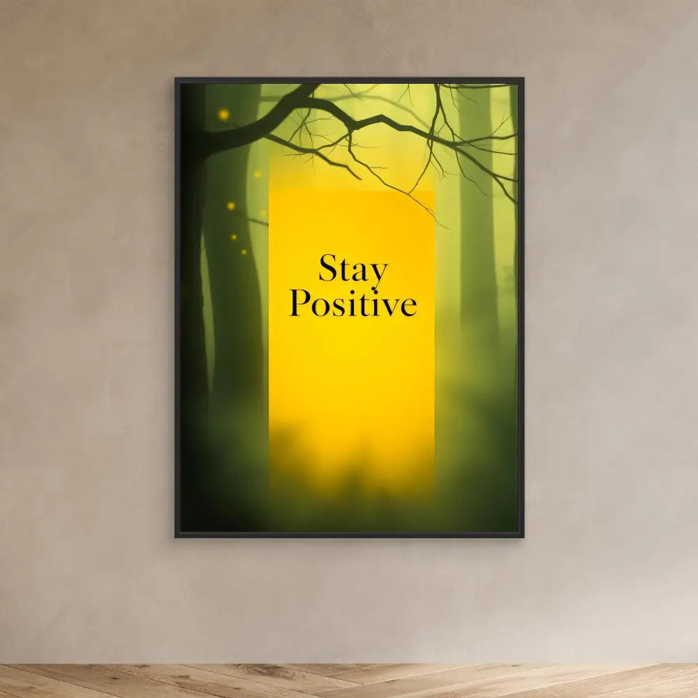 A framed motivational poster with the text ’Stay Positive’ against a misty forest backdrop.