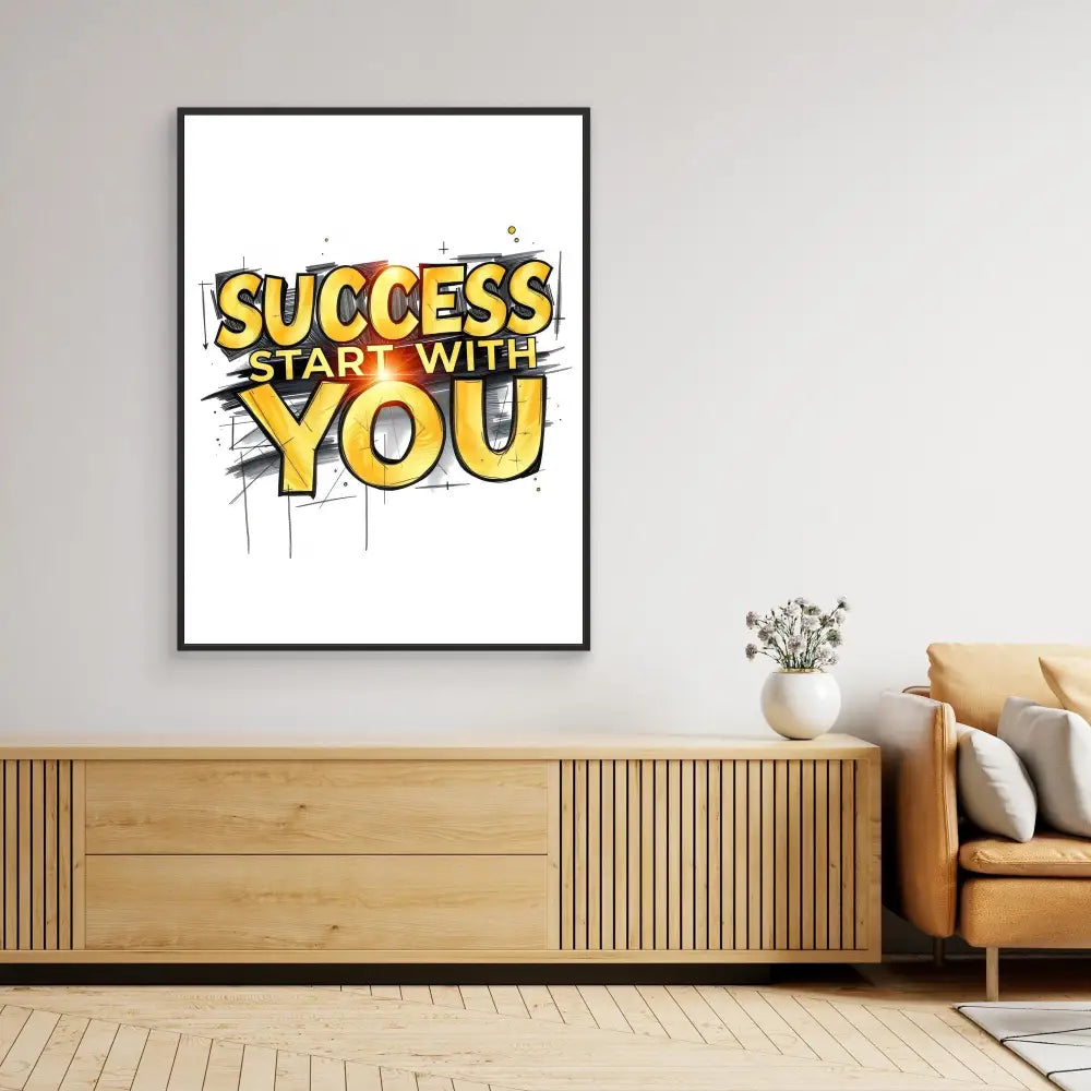 A framed motivational poster featuring yellow text that reads ’SUCCESS START WITH YOU’ in graffiti-style lettering.