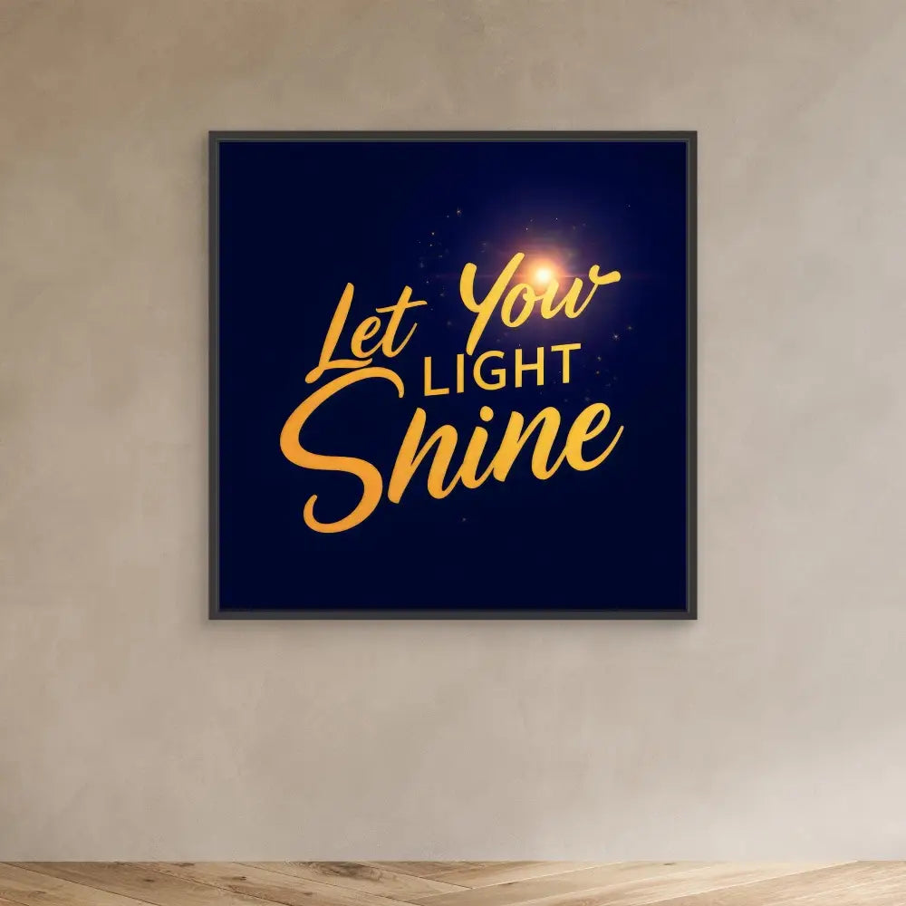 Framed motivational text art displaying ’Let Your Light Shine’ in glowing gold lettering against a dark blue background.