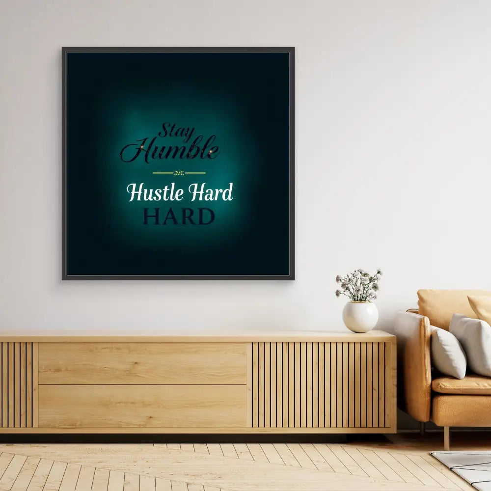 Framed motivational wall art with text ’Stay Humble Hustle Hard’ in turquoise and black tones.