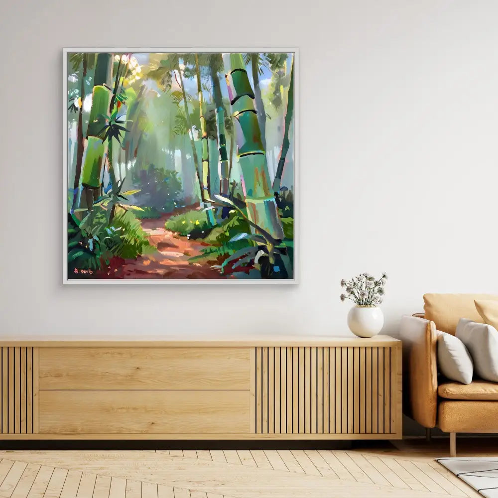 Framed painting of a sunlit bamboo forest with a dirt path winding through it.