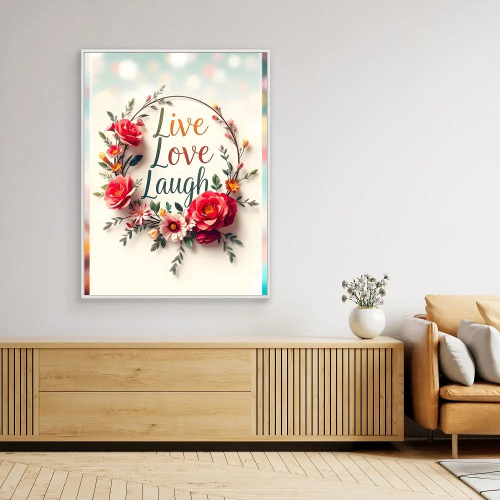 A framed wall art featuring ’Live Love Laugh’ text surrounded by red roses and floral elements.