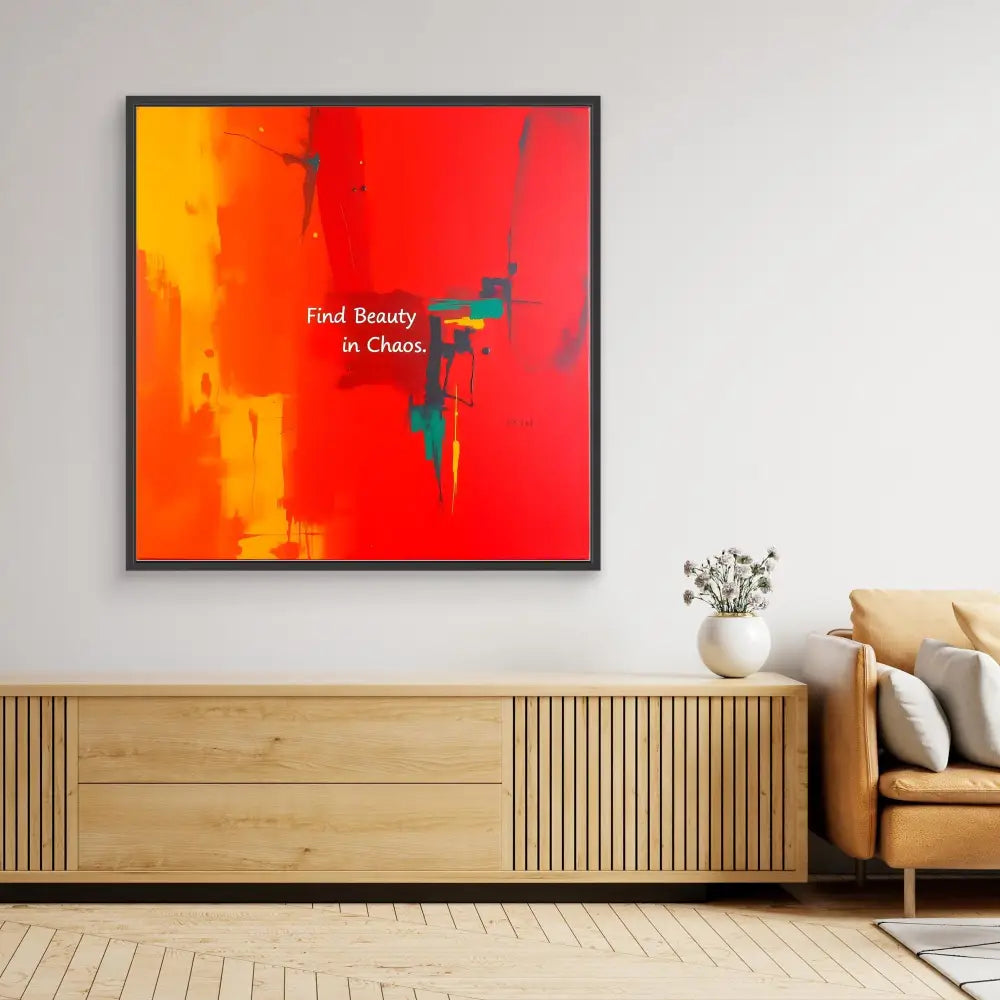 Modern abstract artwork with vibrant orange-red colors and text reading ’Find Beauty in Chaos’ in a black frame.