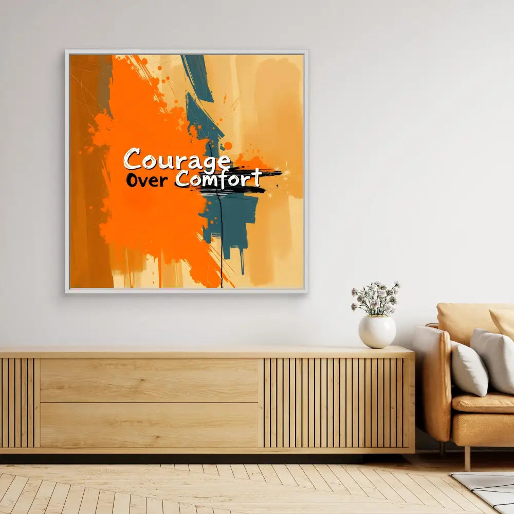 Modern wall art featuring the text ’Courage over Comfort’ on an orange and teal abstract background.