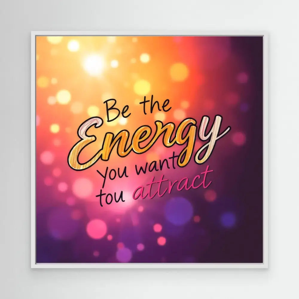 A motivational quote reading ’Be the Energy you want to attract’ with stylized text against bokeh lighting effects.