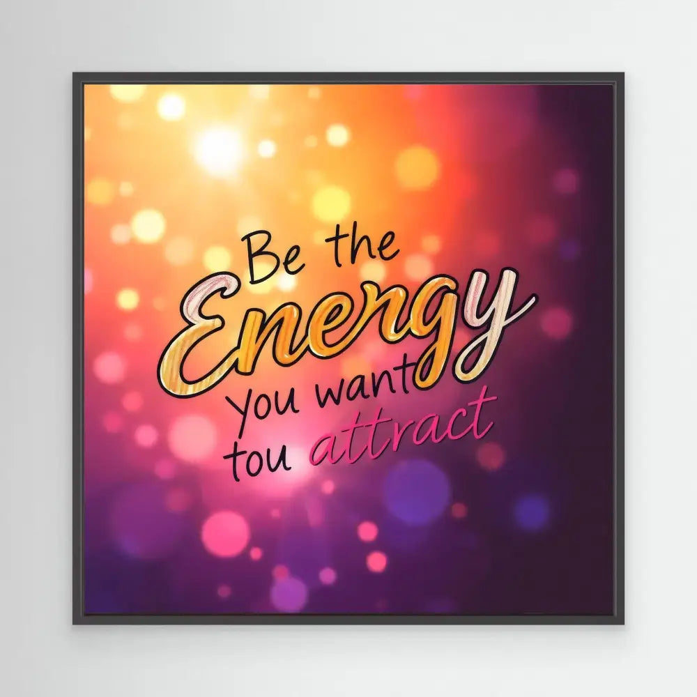 A motivational quote reading ’Be the Energy you want to attract’ with stylized text on a colorful bokeh background.