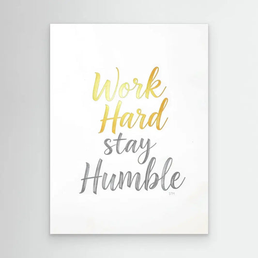 Motivational text art featuring ’Work Hard stay Humble’ in gold and gray watercolor lettering.