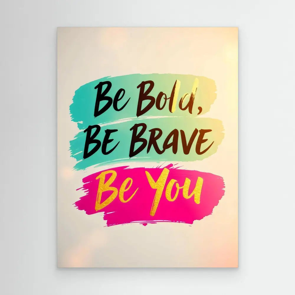 Motivational text in brush strokes reading ’Be Bold, Be Brave, Be You’ in black and yellow letters on turquoise and pink paint swatches.