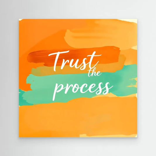 Motivational text ’Trust the process’ on orange and teal watercolor brushstrokes.