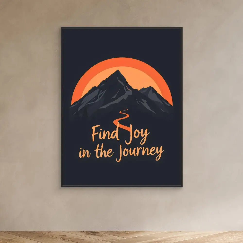 Motivational wall art featuring mountains against an orange sun with the text ’Find Joy in the Journey’