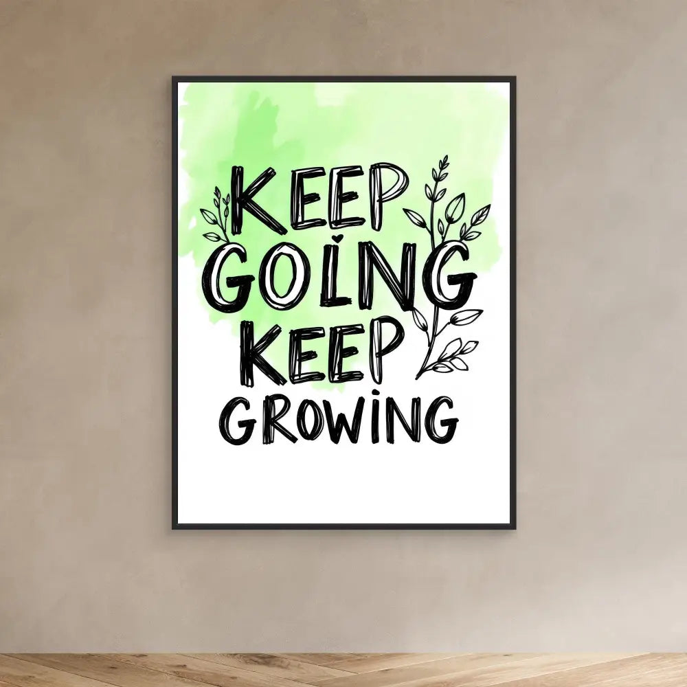 A motivational wall art print featuring hand-lettered text ’Keep Going Keep Growing’ with decorative leaf elements in green and black.