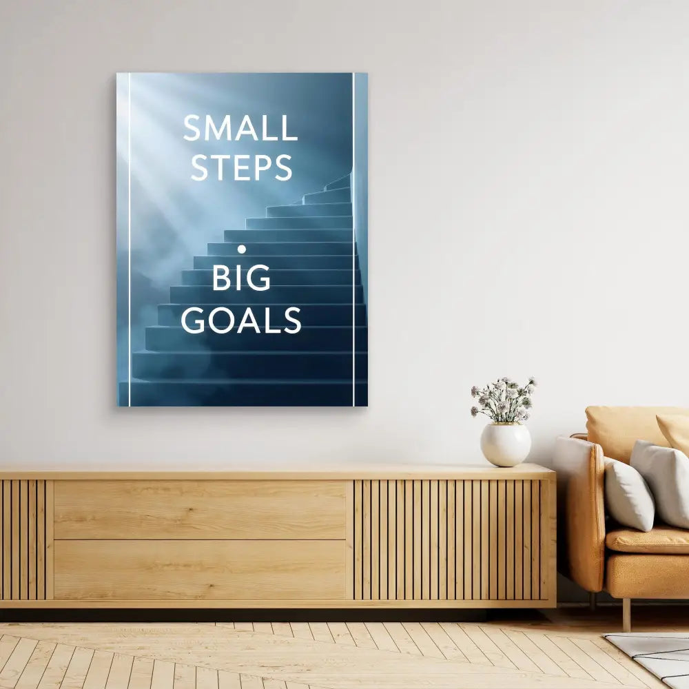 Motivational wall art featuring stairs with text ’SMALL STEPS BIG GOALS’ in white lettering.