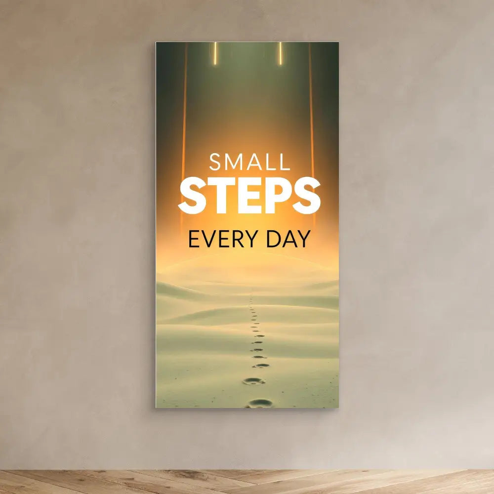 A motivational wall art displaying ’SMALL STEPS EVERY DAY’ with footprints fading into the distance.