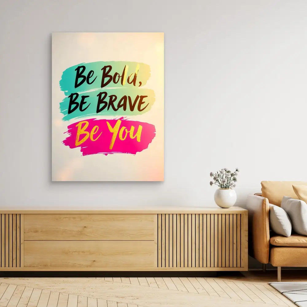 Motivational wall art featuring the text ’Be Bold, Be Brave, Be You’ in turquoise and pink brush strokes.