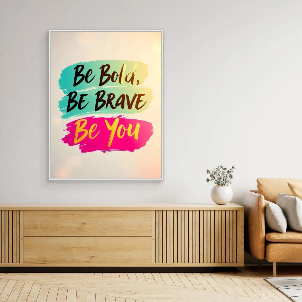 Motivational wall art featuring the text ’Be Bold, Be Brave, Be You’ in turquoise and pink brushstrokes.