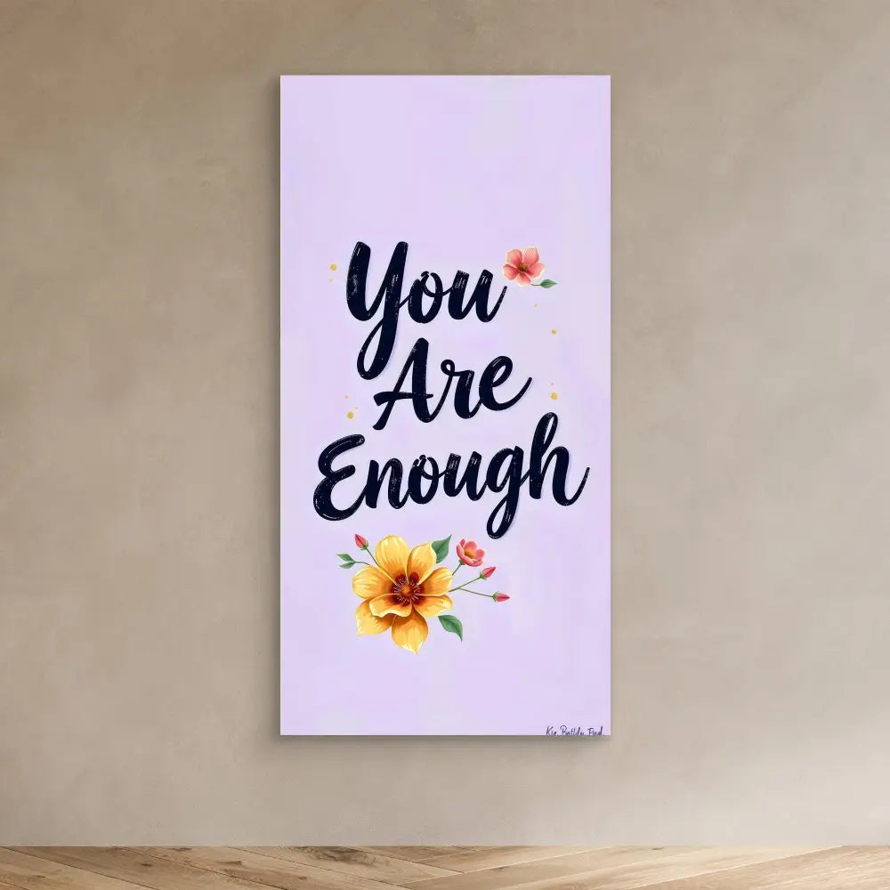 A motivational wall art featuring ’You Are Enough’ text with floral accents.