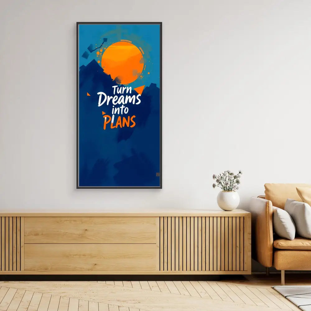 Motivational wall art featuring the text ’Turn Dreams into Plans’ with an orange sun design on a blue background.