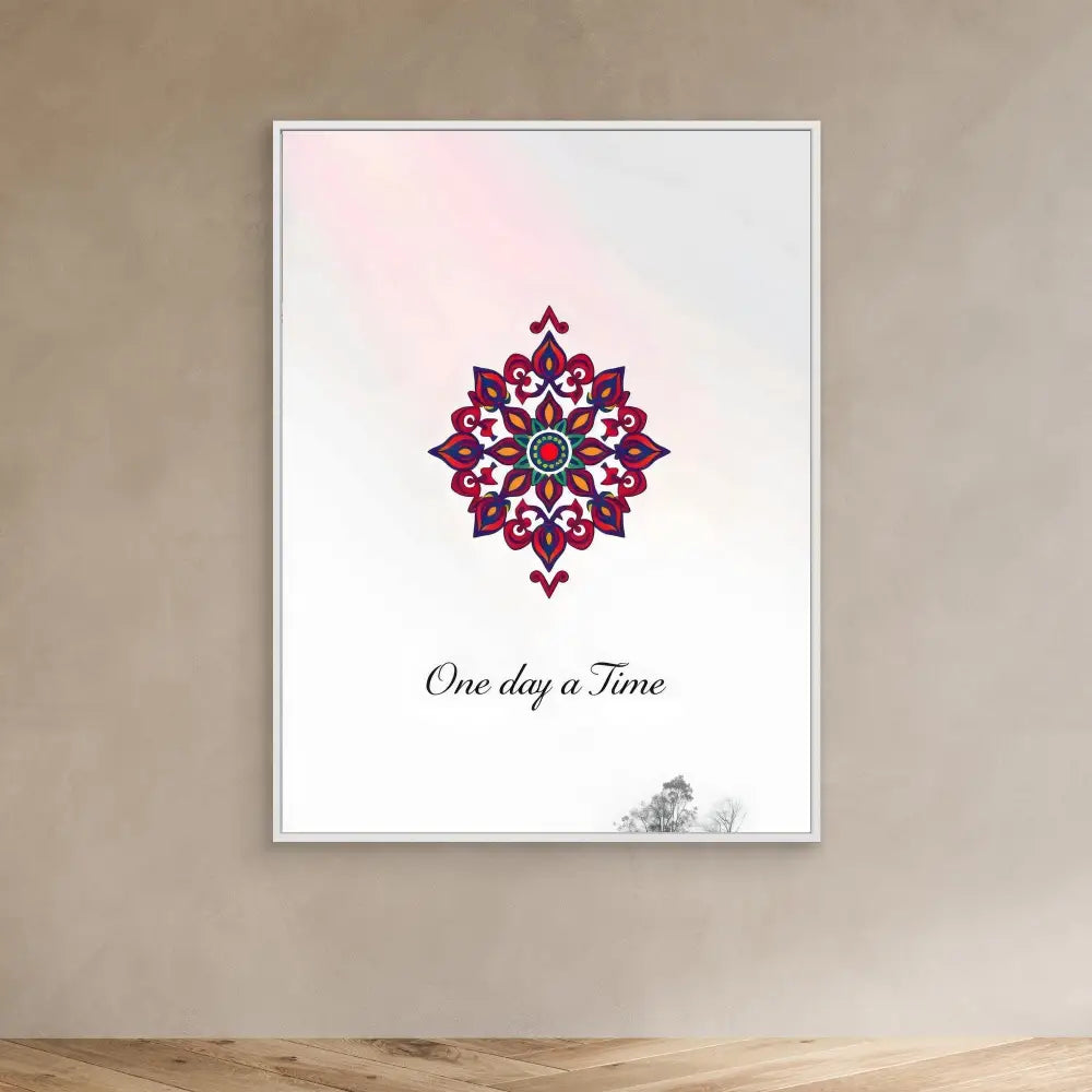 A pink and blue mandala design with the text ’One day a Time’ beneath it.