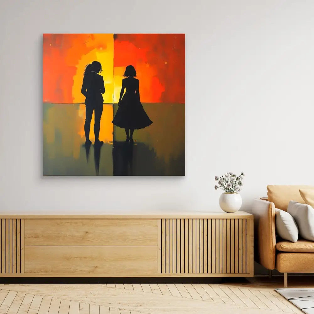 Silhouetted figures standing together against a vibrant orange sunset backdrop.