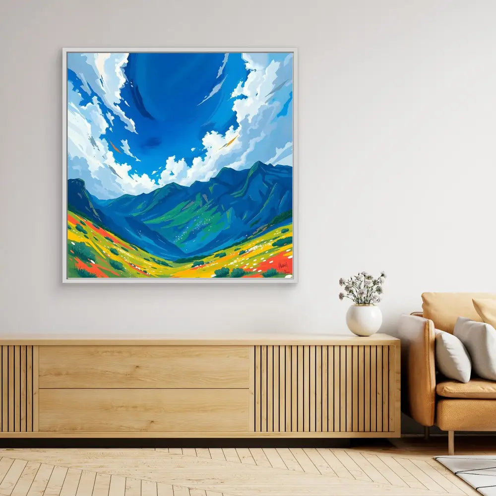 Vibrant landscape painting featuring mountains, wildflower meadows and dramatic blue skies with white clouds.