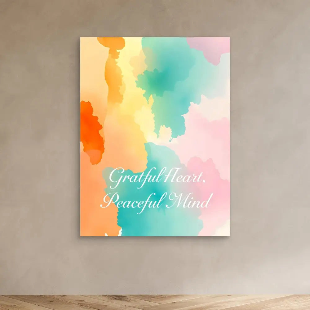 Watercolor-style wall art featuring the text ’Grateful Heart, Peaceful Mind’ in soft orange, turquoise and pink tones.