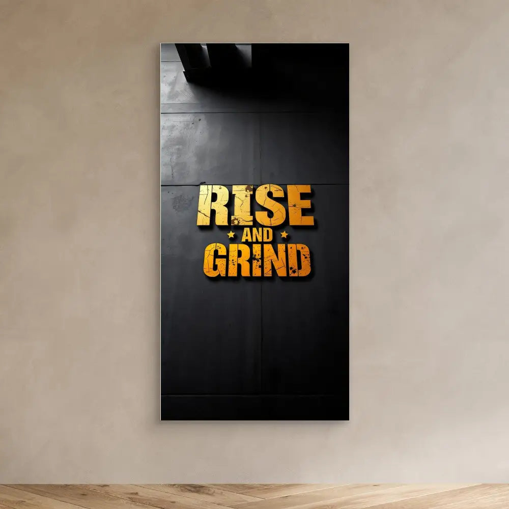 Yellow and orange text reading ’RISE AND GRIND’ on a black surface.